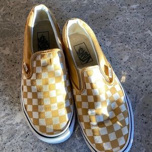 Vans yellow checked slip on shoe.
